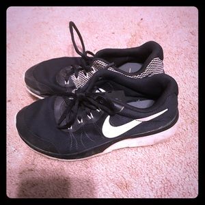 Girls black Nike shoes